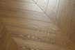 Ламинат WoodStyle Chevron Дуб Серпиенто 550х112х12мм 34кл с фаской