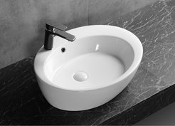 Раковина на столешницу Ceruttispa CR7026A (600х470х140) белая, овальная
