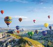 Фотообои Полет монгольфьеров 300х270см виниловые на флизелиновой основе