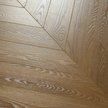 Ламинат WoodStyle Chevron Дуб Серпиенто 550х112х12мм 34кл с фаской Ламинат WoodStyle Chevron Дуб Серпиенто 550х112х12мм 34кл с фаской